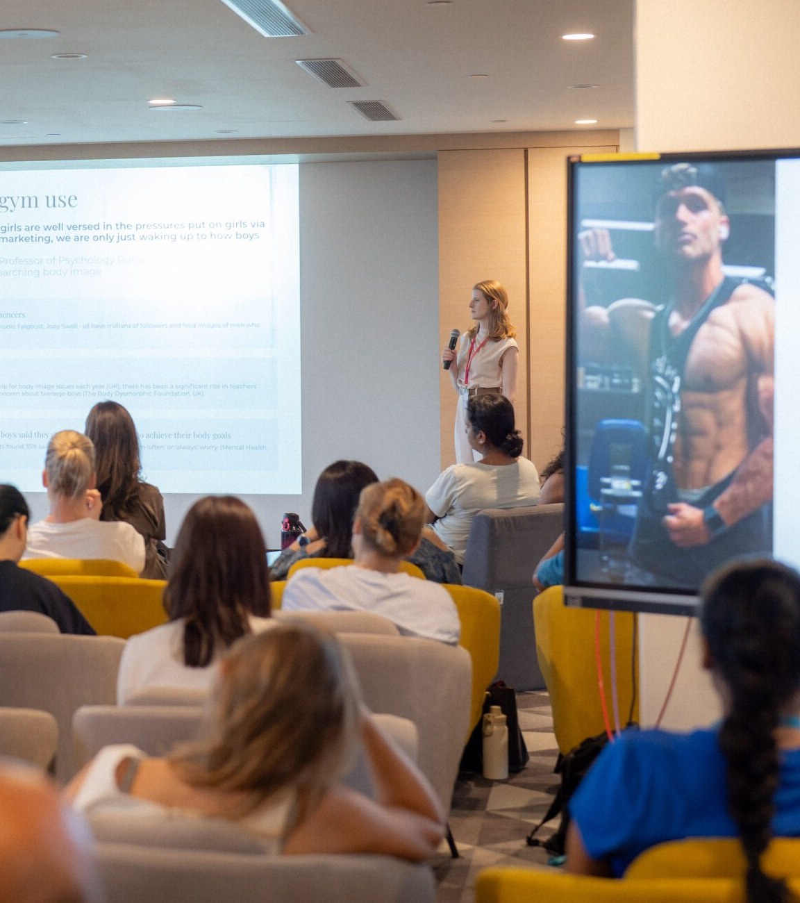 Dr Marie-Claire Reville presenting to a room of parents